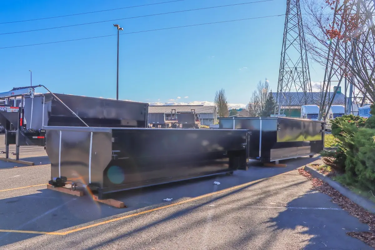 Roll-off dumpster ready for waste disposal at job site for Yard Waste Dumpster Rental in Long Beach